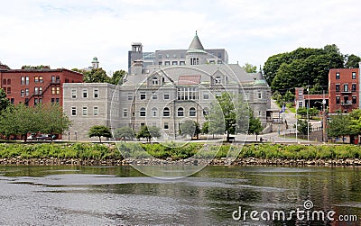 Olde Federal Building, landmark edifice, waterfront view across the Kennebec River, Augusta, ME, USA Stock Photo
