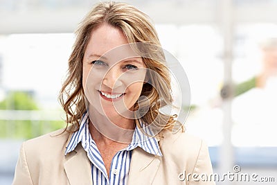 Older business woman in office Stock Photo