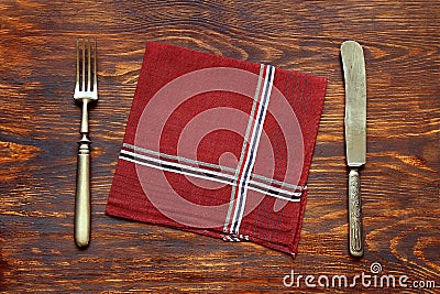 Older cutlery with napkin Stock Photo