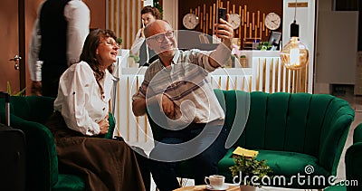 Older guests using videocall connection Stock Photo