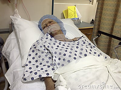 Older male hospital patient awaiting surgery Stock Photo
