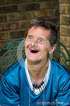 Older Man With Downs Syndrome and No Teeth Delightful Smile Stock Photo