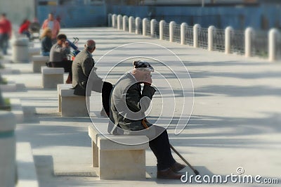 Older men on benches Editorial Stock Photo