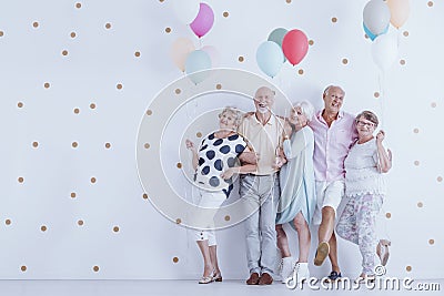 Older people with balloons Stock Photo