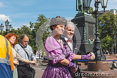Older people spend their leisure time dancing in the square Editorial Stock Photo