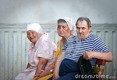 Older people: three Russian pensioners on a bench Editorial Stock Photo