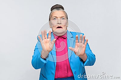 Older woman scared, have fear face Stock Photo