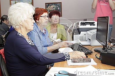 Older women in social center on the international day of an elderly person Editorial Stock Photo