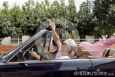 Older woman and a young woman driving a convertible Stock Photo