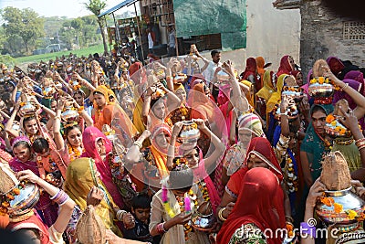 The oldest custom of Rajasthan is the hotty or the elder girls who headed to the Kals Leke temple on their head. Editorial Stock Photo