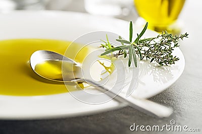 Olive Oil with herbs Stock Photo