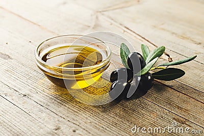 Olive oil with leaves and olives Stock Photo