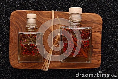 Olive oil with spices and herbs Stock Photo