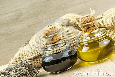 Olive oil and vinegar with thyme, onion, herbs provences Stock Photo