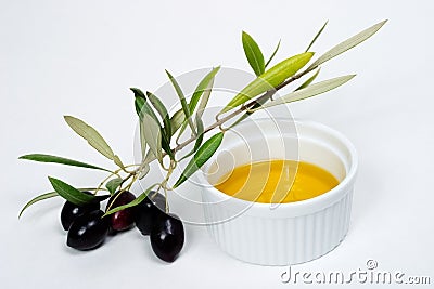 Olives twig and pure olive oil Stock Photo