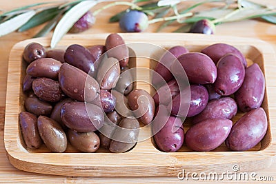 Olives on wooden background, kalamata, kalamon, green olives Stock Photo