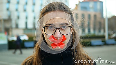 OLOMOUC, CZECH REPUBLIC, JANUARY 10, 2019: Extinction rebellion activist girl protest Anna Martinkova sealed mouth with Editorial Stock Photo