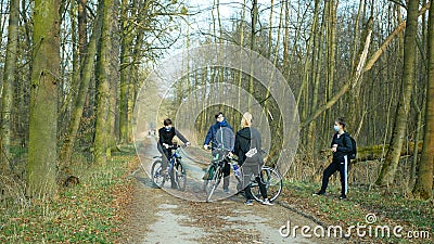 OLOMOUC, CZECH REPUBLIC, MARCH 19, 2020: Children girls boys group on trip bikes wood nature violate Government law Editorial Stock Photo