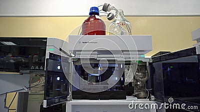 OLOMOUC, CZECH REPUBLIC, SEPTEMBER 16, 2018: Spectrophotometer tube sample analysis laboratory scientist scientific instrument for Editorial Stock Photo