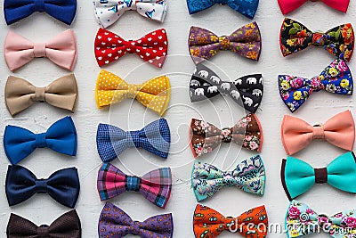 Ð¡olorful bow ties are located in the window Stock Photo
