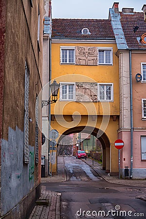 Olsztyn, Poland 2017. 11. 30. main square of the Old Town, ghotic town hall in Olsztyn old city. Old central city yard, arch in t Editorial Stock Photo