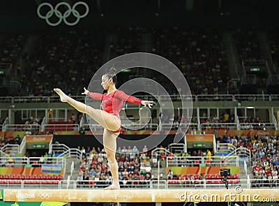 Olympic champion Aly Raisman of United States competes on the balance beam at women's all-around gymnastics at Rio 2016 Editorial Stock Photo