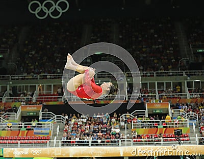 Olympic champion Aly Raisman of United States competes on the balance beam at women`s all-around gymnastics at Rio 2016 Olympics Editorial Stock Photo