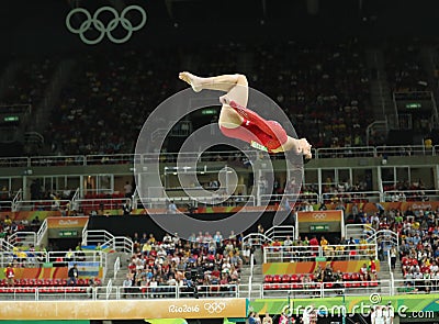 Olympic champion Aly Raisman of United States competes on the balance beam at women`s all-around gymnastics at Rio 2016 Olympics Editorial Stock Photo