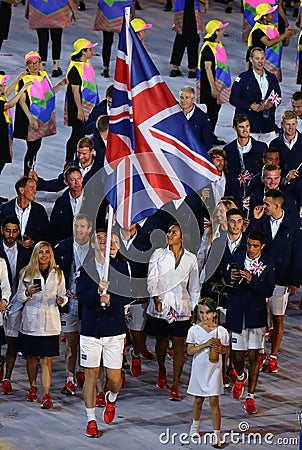 Olympic champion Andy Murray carrying the United Kingdom flag leading the Olympic team Great Britain in Rio 2016 Opening Ceremony Editorial Stock Photo