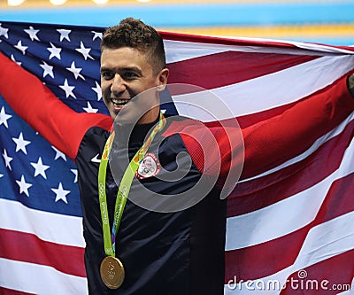Olympic Champion Anthony Ervin of United States during medal ceremony after Men`s 50m Freestyle final of the Rio 2016 Olympics Editorial Stock Photo