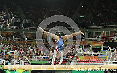 Olympic champion Simone Biles of United States competing on the balance beam at women's all-around gymnastics at Rio 2016 Editorial Stock Photo
