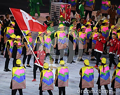 Olympic champion trampoline gymnast Rosie MacLennan carrying Canadian flag leading the Olympic team Canada in the Rio 2016 Opening Editorial Stock Photo