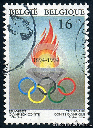 Olympic rings, Olympic flame, International Olympic Committee IOC Centenary, circa 1994 Editorial Stock Photo