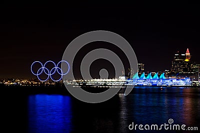 Olympic rings and lit up Canada Place, Vancouver, BC Editorial Stock Photo