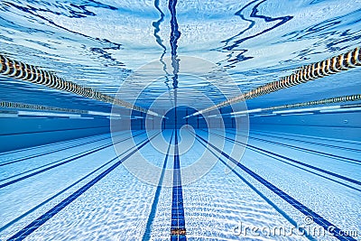 Olympic Swimming pool under water background Stock Photo