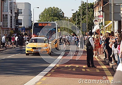 Olympic Torch Relay Vehicles and crowds, London Editorial Stock Photo