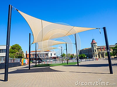 Design triangle shading umbrellas in the front of Fishermen`s Wharf Market at Port Adelaide. Editorial Stock Photo