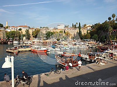 Small ships, sailboats and yachts in harbor of Antalya Editorial Stock Photo