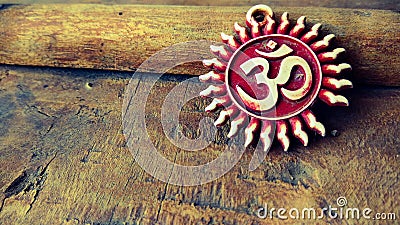 Om pendent on wood background and greeting Stock Photo