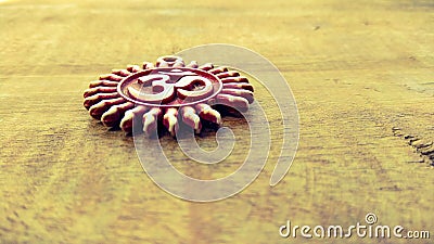 Om pendent on wood background and greeting Stock Photo