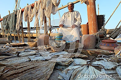 Omani fisherman selling his products Editorial Stock Photo