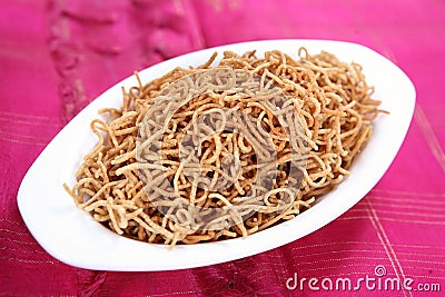 Bamboo rice crom seeds snack/ Moongil arisi Omapodi Stock Photo