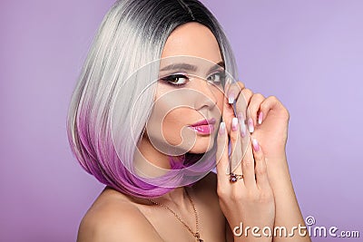 Ombre bob short hairstyle. Woman portrait with blond purple hair and manicured nails. Beauty makeup. Beautiful girl model isolated Stock Photo