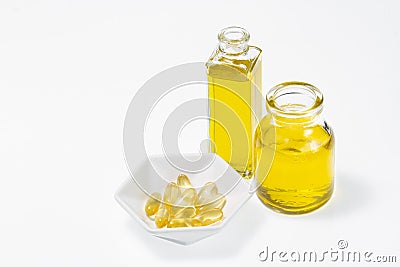 Omega-3 in capsules and glass container Stock Photo