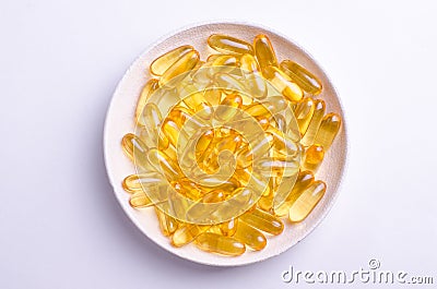 Omega 3 capsules. Supplement food capsules with oil of nordic fish oil. Vitamins and tablets against white Stock Photo