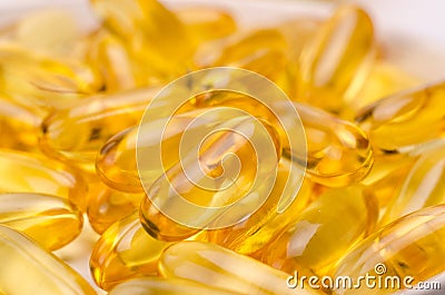 Omega 3 capsules. Supplement food capsules with oil of nordic fish oil. Vitamins and tablets against white Stock Photo