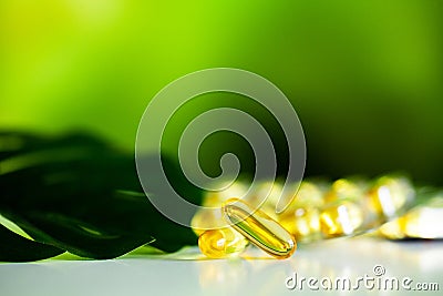 Omega 3 fish oil yellow soft gel capsules Stock Photo