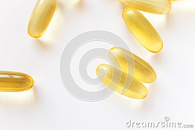 Omega 3 pills, golden fish oil capsules Stock Photo