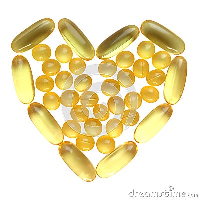 Omega Pills in a heart shape isolated on white background Stock Photo