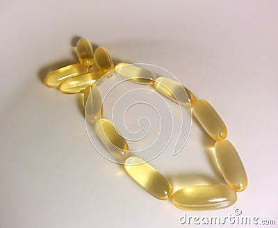 Omega pills making fish figure Stock Photo